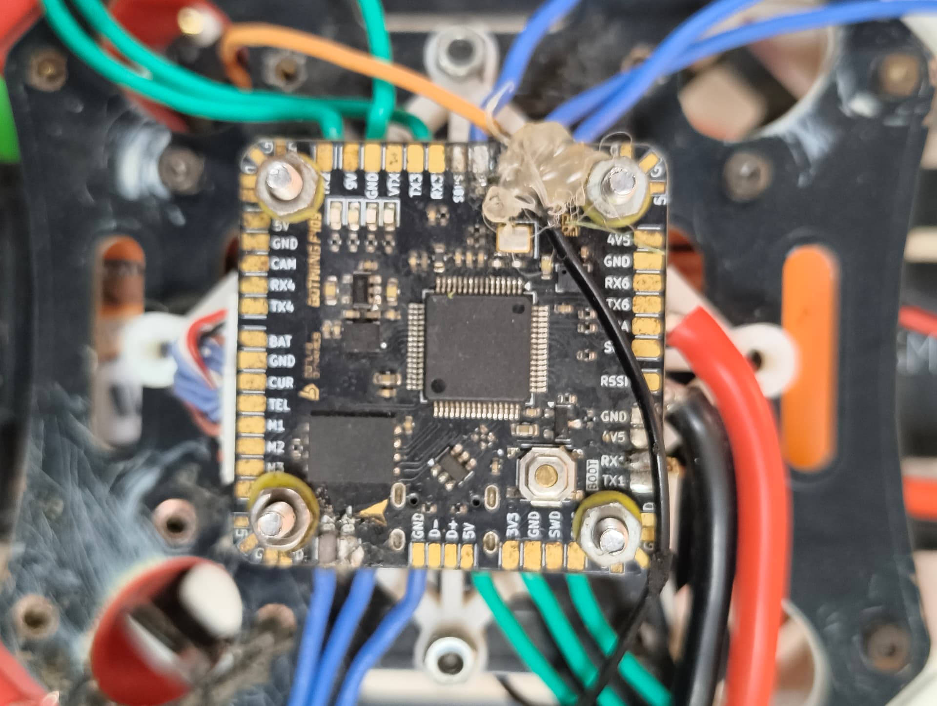 High-density STM32 F405 flight controller PCB pinout and vibration damping mount